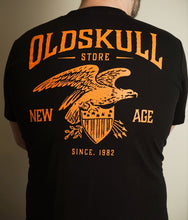 Load image into Gallery viewer, This shirt is similar to the Harley Davidson style of shirts.  It is black with orange print.  It has a small Oldskull Shirts logo on the front.  On the back it has an large eagle over a shield design with the words Oldskull Store written over it.  It is a vintage streetwear design.